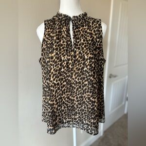 Like new J. Crew sleeveless animal print top. Lined. Size M. Cute!